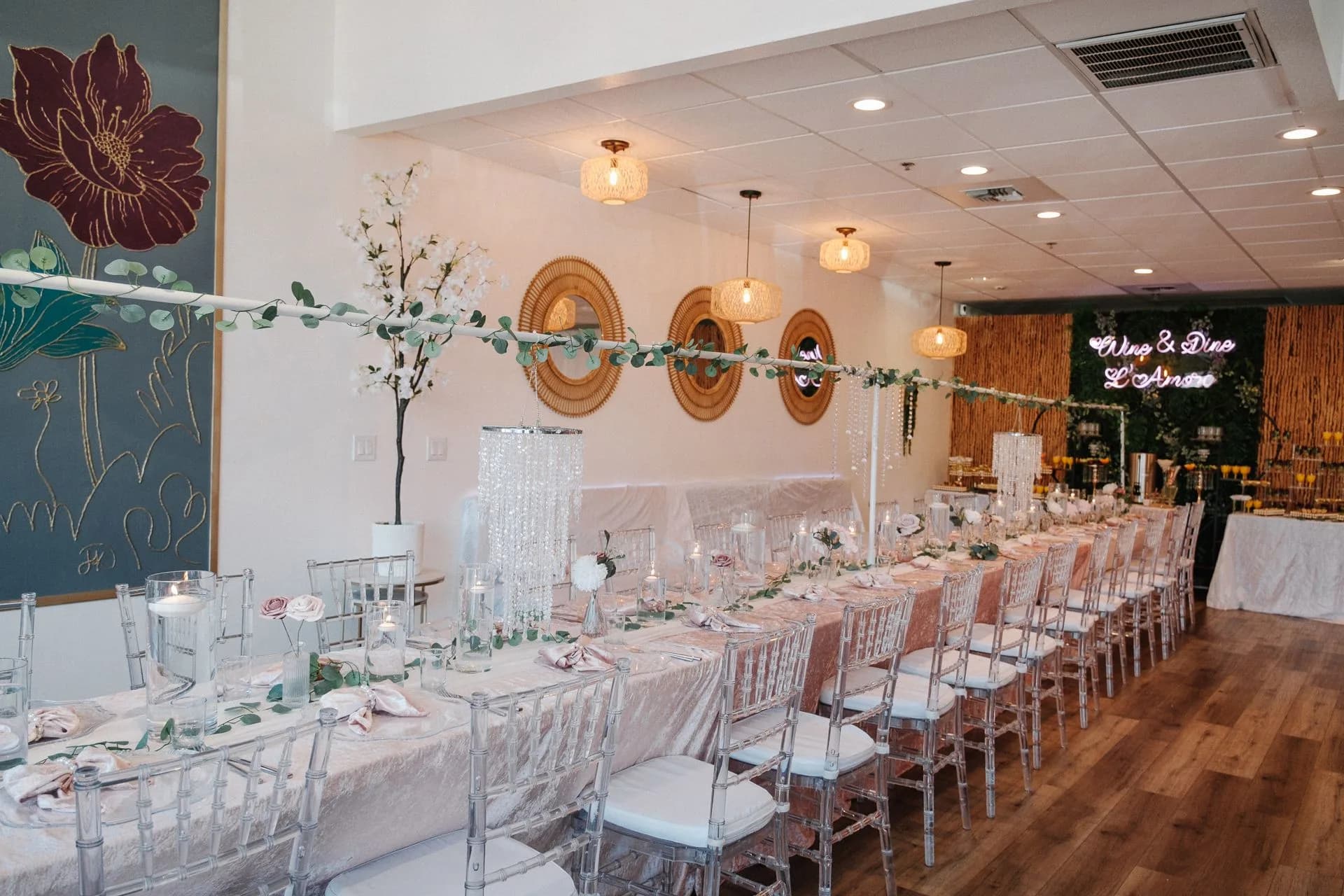 L’Amore private room set with long blush tables and clear chairs