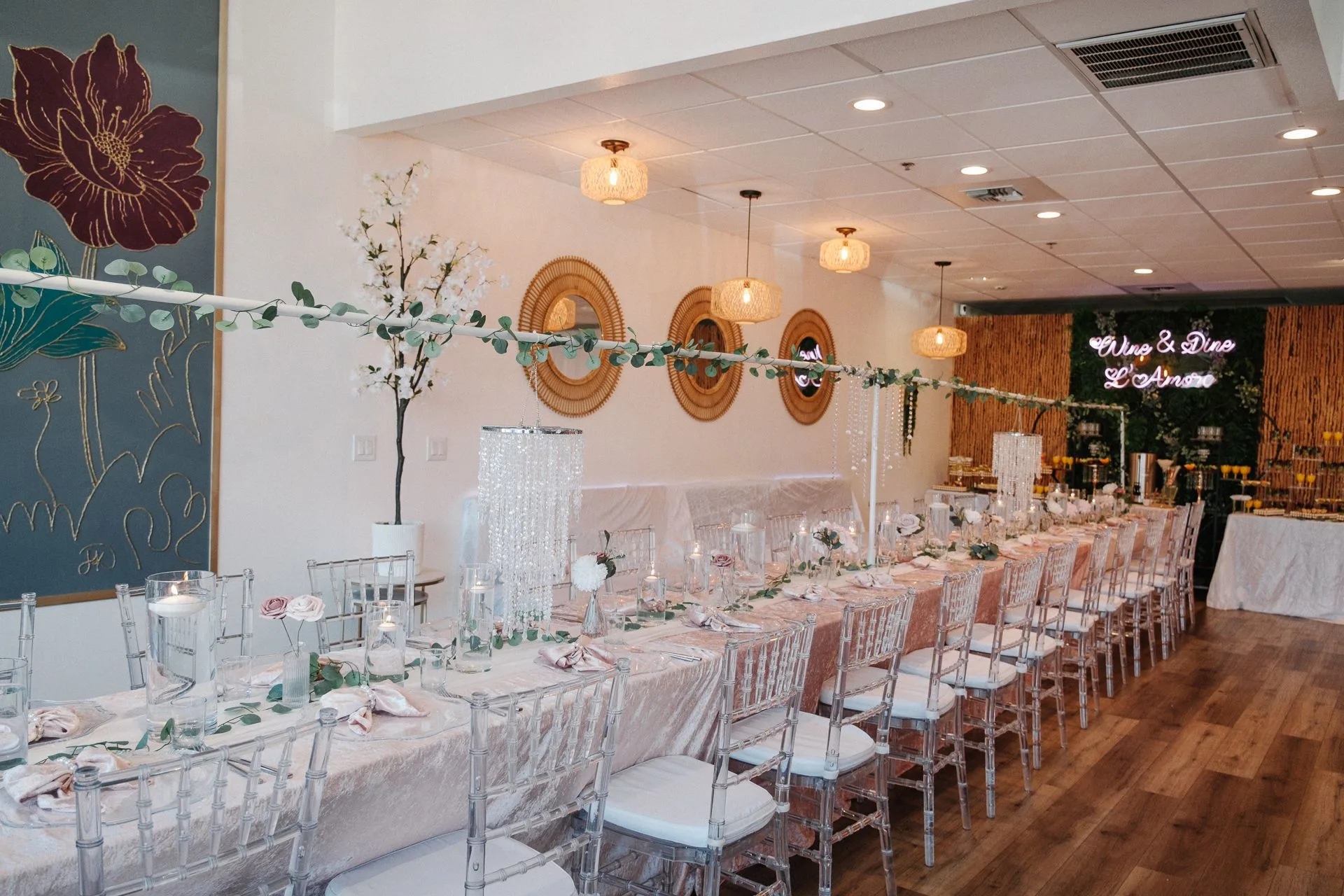 L’Amore private room set with long blush tables and clear chairs